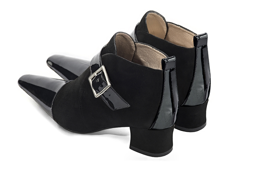 Gloss black women's ankle boots with buckles at the front. Tapered toe. Low kitten heels. Rear view - Florence KOOIJMAN